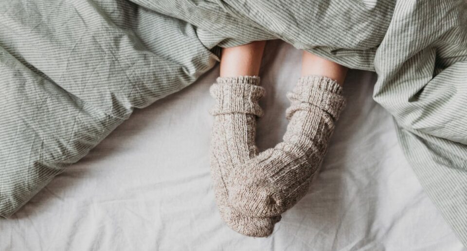 Wearing socks to bed helps you fall asleep faster and stay asleep longer — here’s why